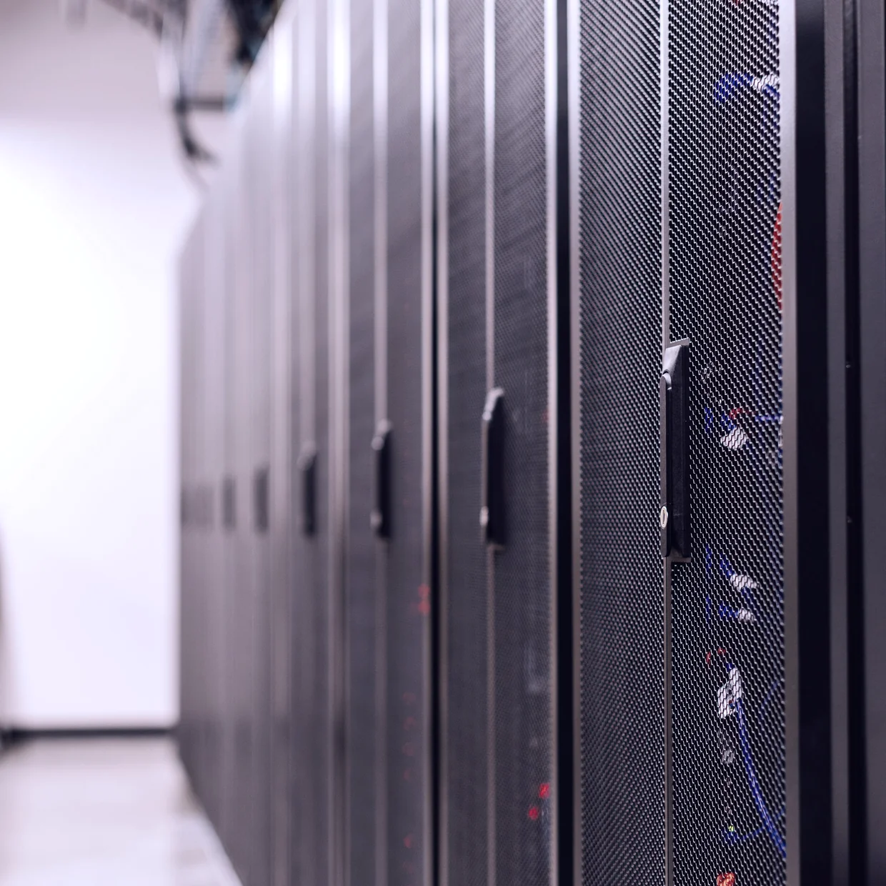 A row of server racks in a data centre.